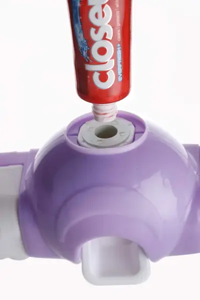 [2139_magic_toothpaste_disp] Automatic Push Toothpaste Squeezer Dispenser